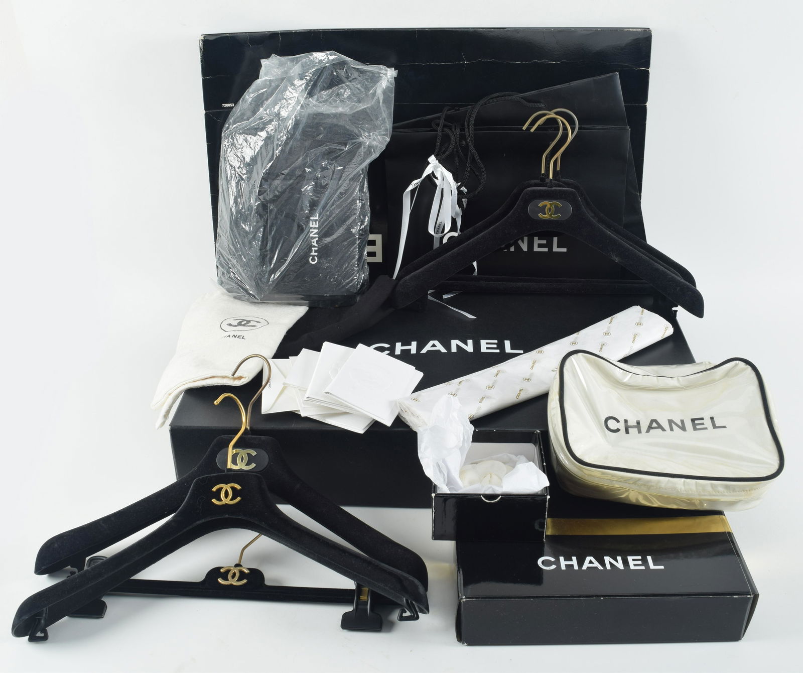 Collection of Chanel brand retail ephemera including a fabric rose, bags, cards/envelopes, hangers,: Collection of Chanel brand retail ephemera including a fabric rose, bags, cards/envelopes, hangers, dust bags, boxes, etc.