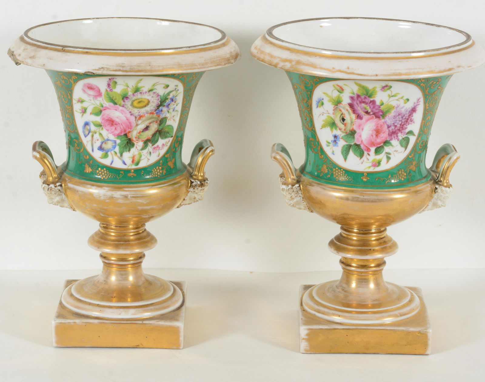 Pair of Paris porcelain classical urns with large floral painted panels with gilt decorations and (1 of 11)