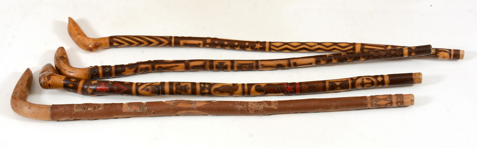 Lot of 4 Folk art carved canes, early 20th Century. Relief carved bark with assorted figures, tools (1 of 13)