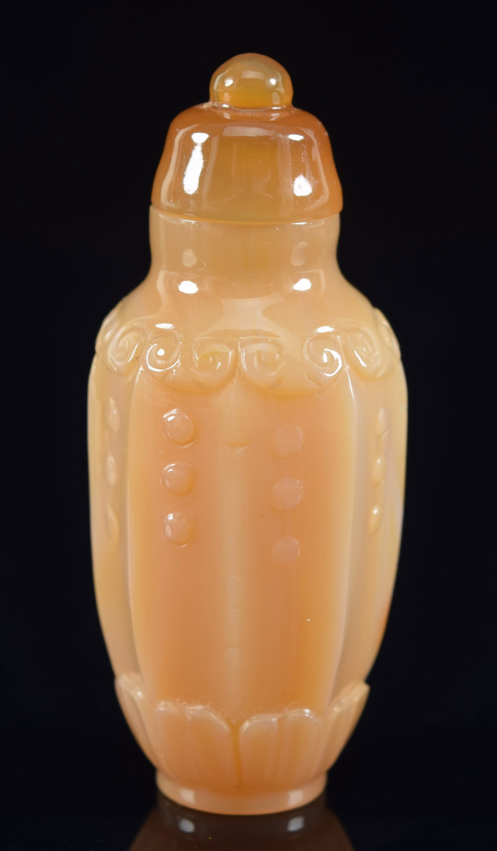 Agate snuff bottle. China. Amber colored tan stone. Octagonal form. Well hollowed. 2.75in H.: Agate snuff bottle. China. Amber colored tan stone. Octagonal form. Well hollowed. 2.75in H. Provenance: The Mitchell Bistany Collection.