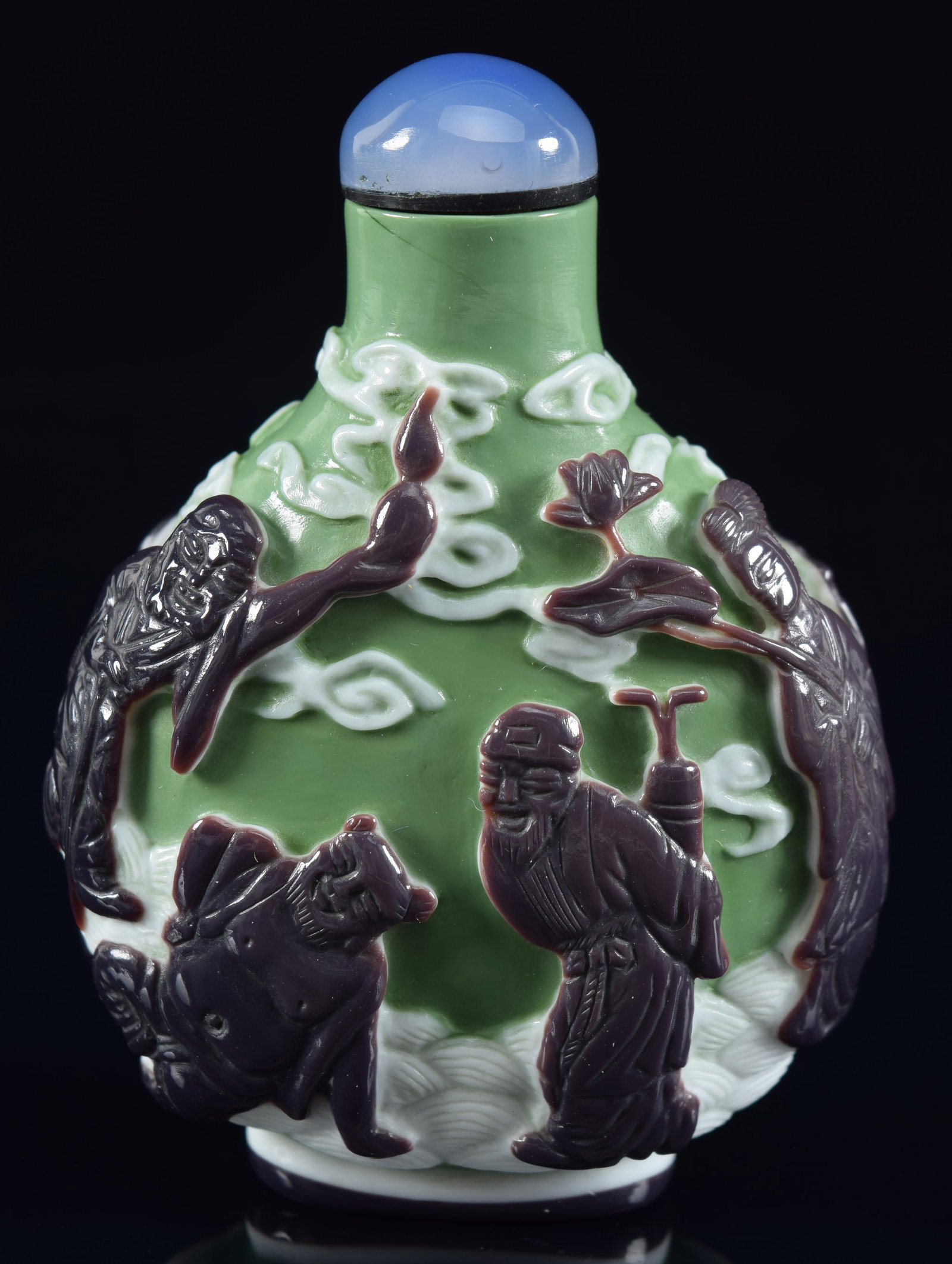 3 color cameo glass bottle. China. 19th century? Black, white cut to green with the immortals.: 3 color cameo glass bottle. China. 19th century? Black, white cut to green with the immortals. 2.75in H. Provenance: The Mitchell Bistany Collection.