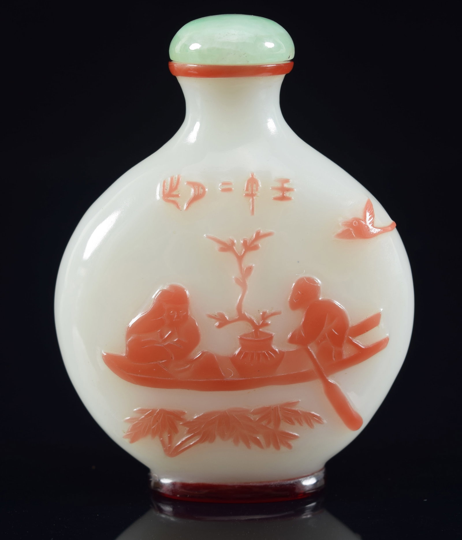 Cameo glass snuff bottle. China. 19th century. Yang Chou school. Red cut to white. Scenes of the: Cameo glass snuff bottle. China. 19th century. Yang Chou school. Red cut to white. Scenes of the immortals. 2.25in H. Provenance: The Mitchell Bistany Collection.