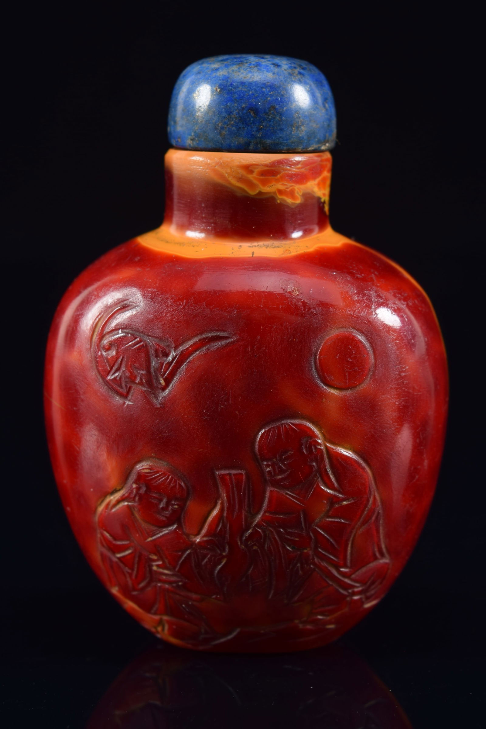 Realgar glass snuff bottle. China. 19th century. Lapis lazuli stopper. 2in H. Provenance: The (1 of 6)