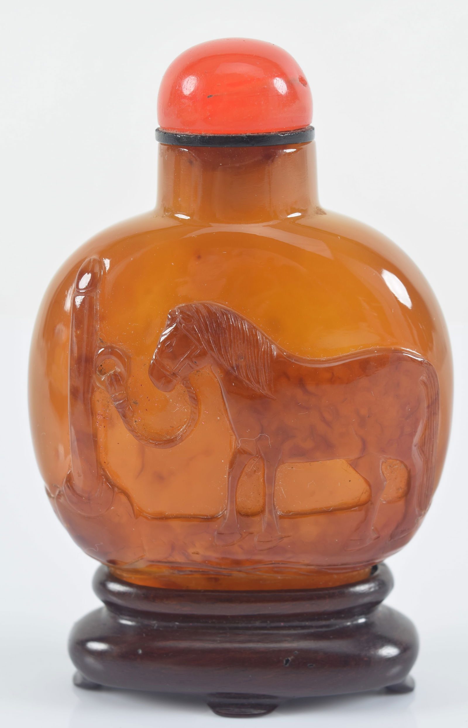 Shadow agate snuff bottle. China. 19th century. Surface carved as a tethered horse and a monkey. (1 of 5)