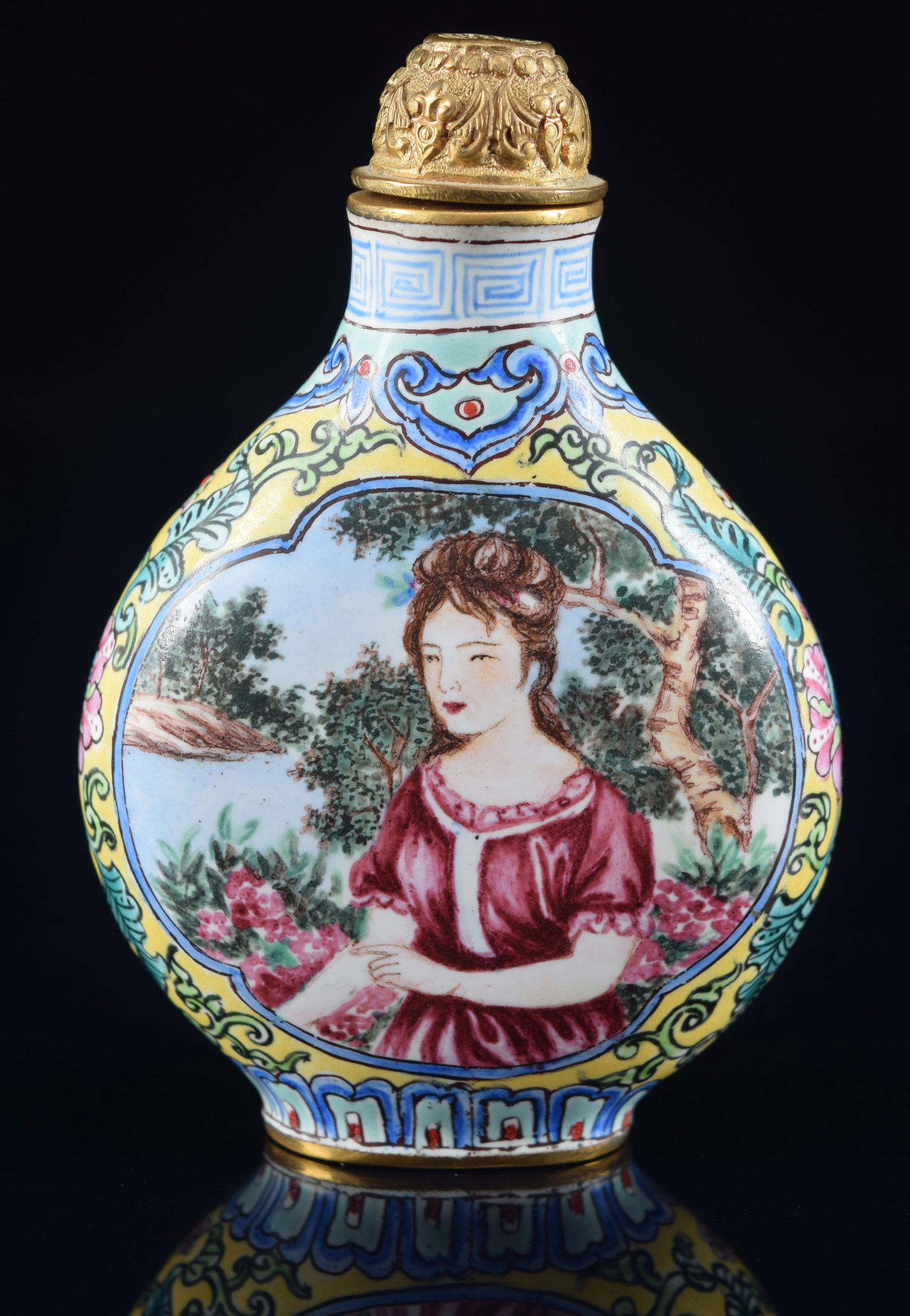 Peking enamel snuff bottle. China. Chien Lung mark, probably about 1900. Scene of a woman in: Peking enamel snuff bottle. China. Chien Lung mark, probably about 1900. Scene of a woman in European dress. 3in L. Provenance: The Mitchell Bistany Collection.