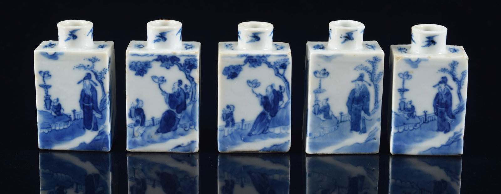 Set of 5 porcelain snuff bottles. China. 19th century. Underglaze blue decoration of scholars and (1 of 9)
