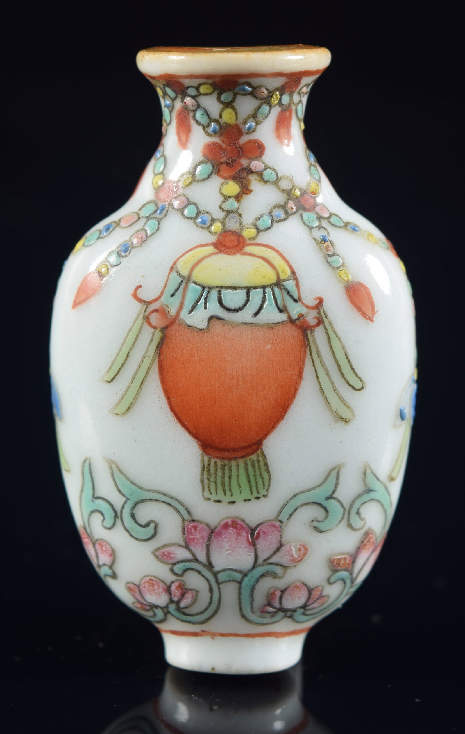 Porcelain snuff bottle. China. 19th century. Chia Ching mark. Famille rose buddhist decoration.: Porcelain snuff bottle. China. 19th century. Chia Ching mark. Famille rose buddhist decoration. 1.75in H. Provenance: The Mitchell Bistany Collection.