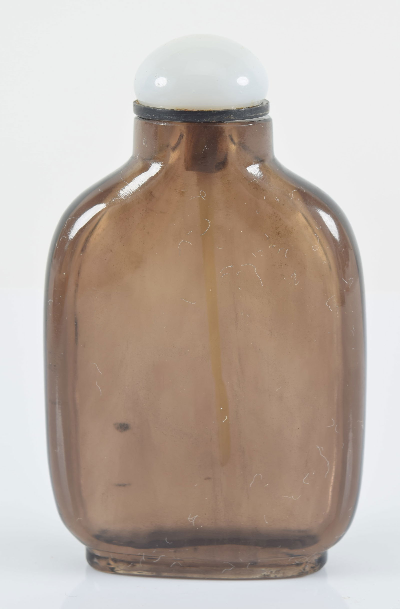 Smoky quartz snuff bottle. China. 19th century. Crystal clear, well hollowed. 2.5in H. Provenance: (1 of 6)