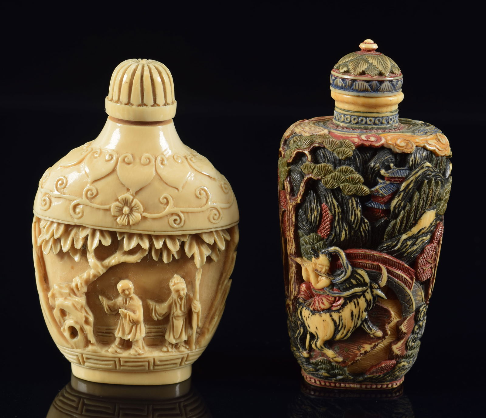 2 snuff bottles. China. 19th century. Surfaces with ornate relief carving. Polychrome decoration to (1 of 6)