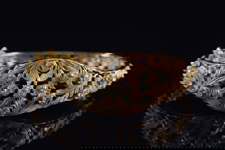 14K gold diamond mounted bracelet. Openwork foliate design set with 35 round cut diamonds, each: 14K gold diamond mounted bracelet. Openwork foliate design set with 35 round cut diamonds, each approx. 2.8 to 3mm diameter. 3.0-3.5ctw. Unmarked. Tests as 14K. Opening: 2in wide. 13.6 grams total