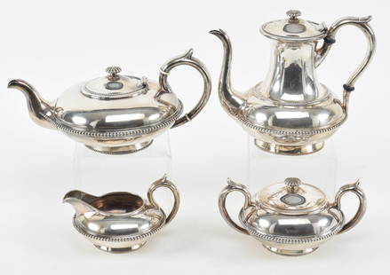 19th century 4-piece silver tea and coffee set. 1) Tall coffee pot by Rand & Crane. Sterling silver.: 19th century 4-piece silver tea and coffee set. 1) Tall coffee pot by Rand & Crane. Sterling silver. Spot repair on top of handle. 7.5in high. 2) Low teapot by Bigelow Bros & Kennard, Boston. Coin