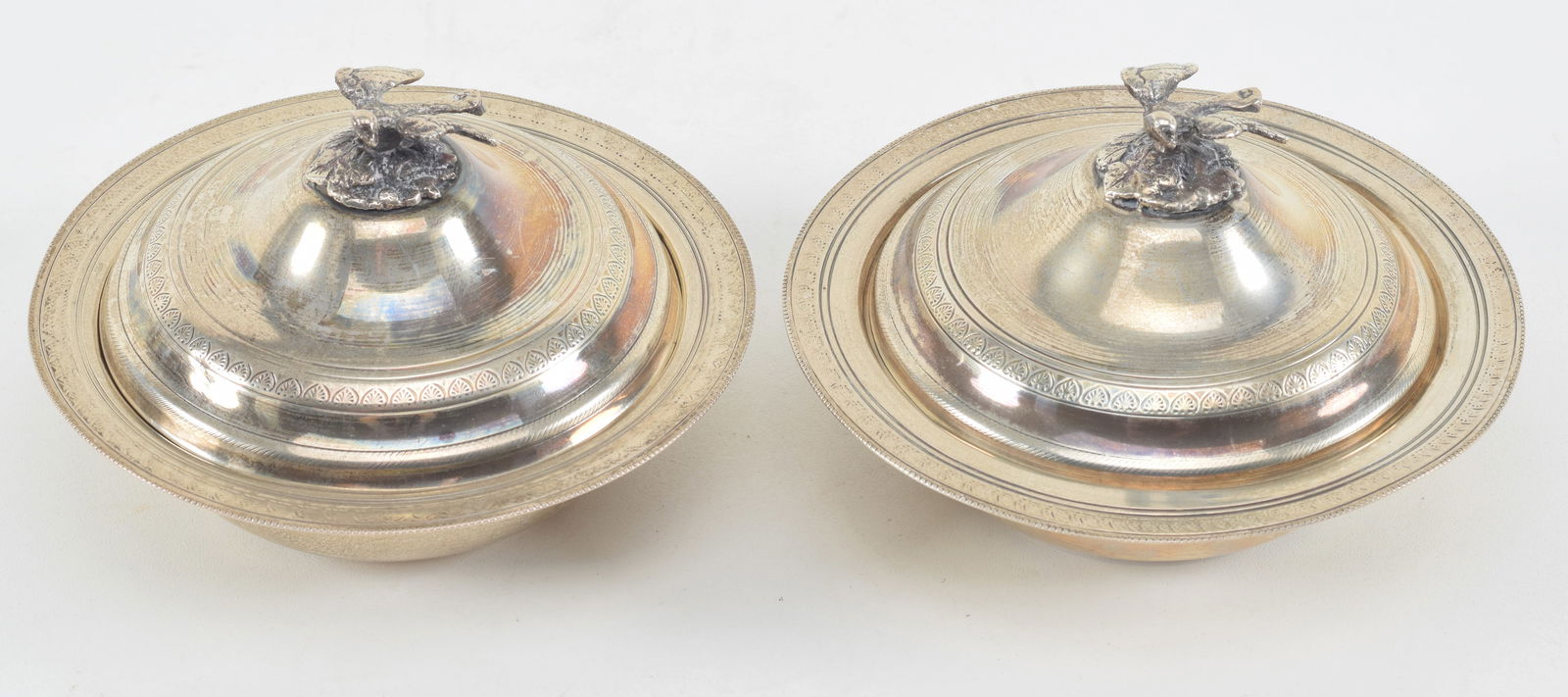 Pair of Egyptian silver covered bowls Bird finials. Engraved pattern on rims and covers. Lids slight (1 of 8)