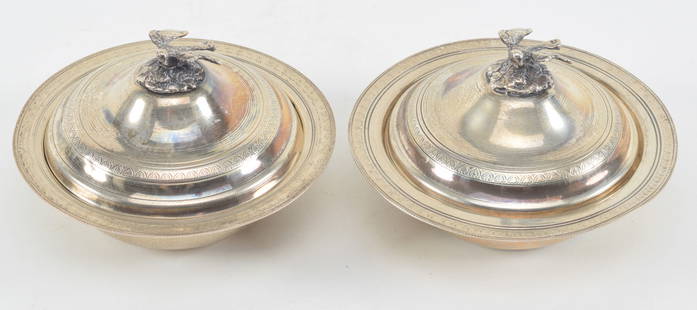 Pair of Egyptian silver covered bowls Bird finials. Engraved pattern on rims and covers. Lids slight: Pair of Egyptian silver covered bowls Bird finials. Engraved pattern on rims and covers. Lids slightly out of round (small dents). Bends to rims. Marked on bases and underside lids. 10.6 ozt total wei