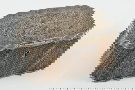 Chinese export silver box with silver overlaid filigree and serpentine form, 18th Century. The box: Chinese export silver box with silver overlaid filigree and serpentine form, 18th Century. The box with gold wash. Height 3in, width 6.5in, depth 5