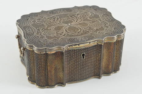 Chinese export silver box with silver overlaid filigree and serpentine form, 18th Century. The box: Chinese export silver box with silver overlaid filigree and serpentine form, 18th Century. The box with gold wash. Height 3in, width 6.5in, depth 5