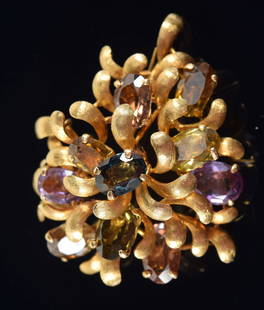 14K gold multi gemstone mounted foliate design brooch. Stones each about 9 x 6.5mm with some: 14K gold multi gemstone mounted foliate design brooch. Stones each about 9 x 6.5mm with some variation. Marked 14K 585 on reverse. 2in wide. 20.8 grams total weight.