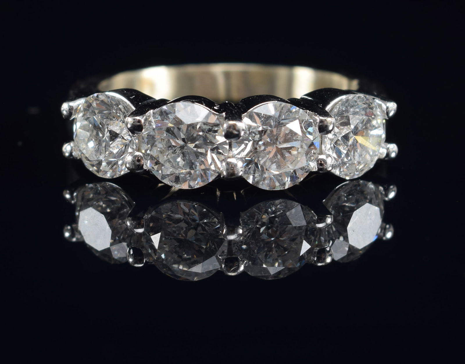 14K gold diamond mounted ring. Approx. 2.5CTW. 4 round cut diamonds approx. 5.4mm diameter each. (1 of 10)