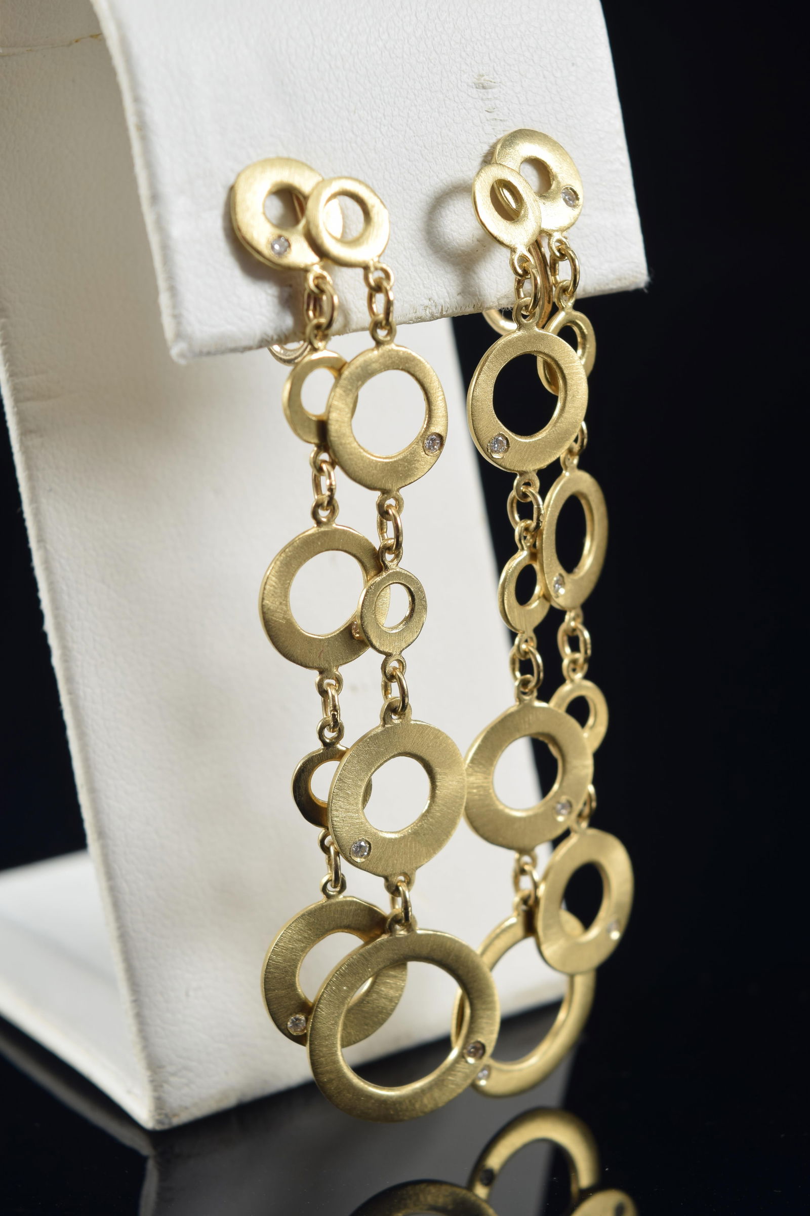 14K gold and diamond modern design circle drop earrings. Screwbacks marked 14K. Circles set with (1 of 5)