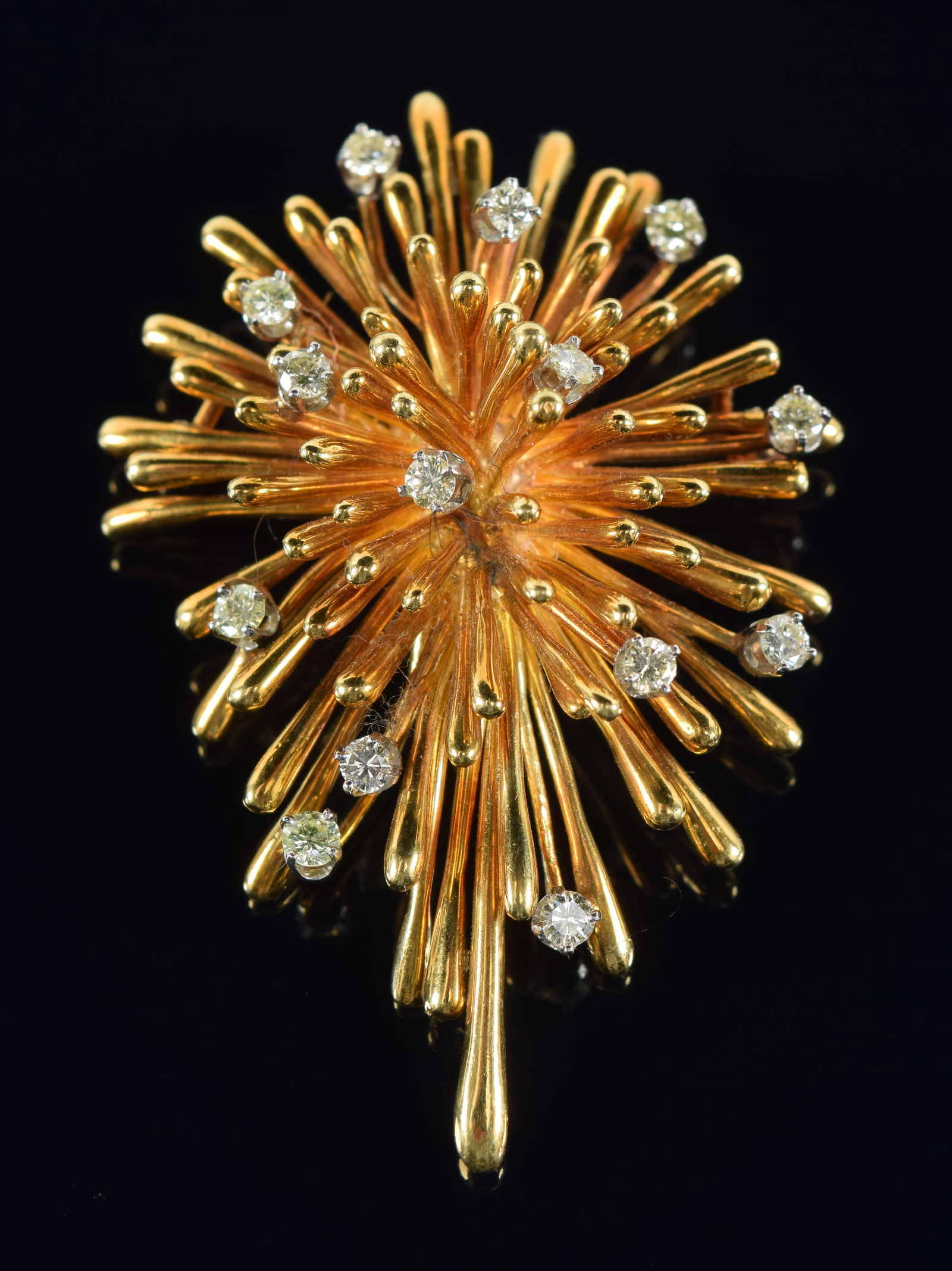 18K gold diamond starburst form brooch, attributed to Tiffany & Co. Design of radiating tapered rays (1 of 4)