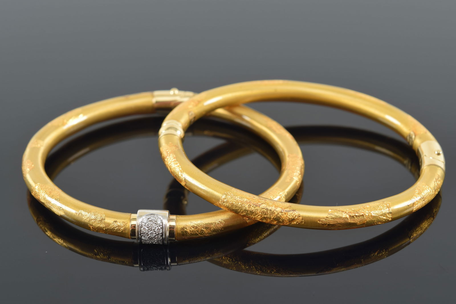 2 18K gold and enamel cuff bracelets. Gold leaf splash design. 1 marked Soho and with white gold (1 of 8)