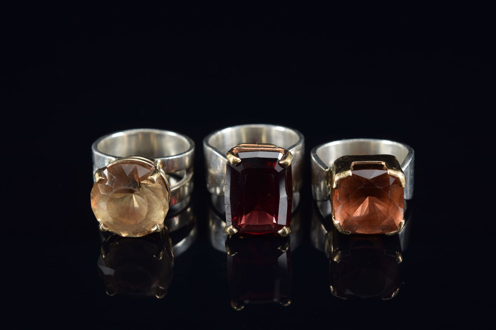 3 gold and silver designer gemstone mounted rings. (1 of 2)