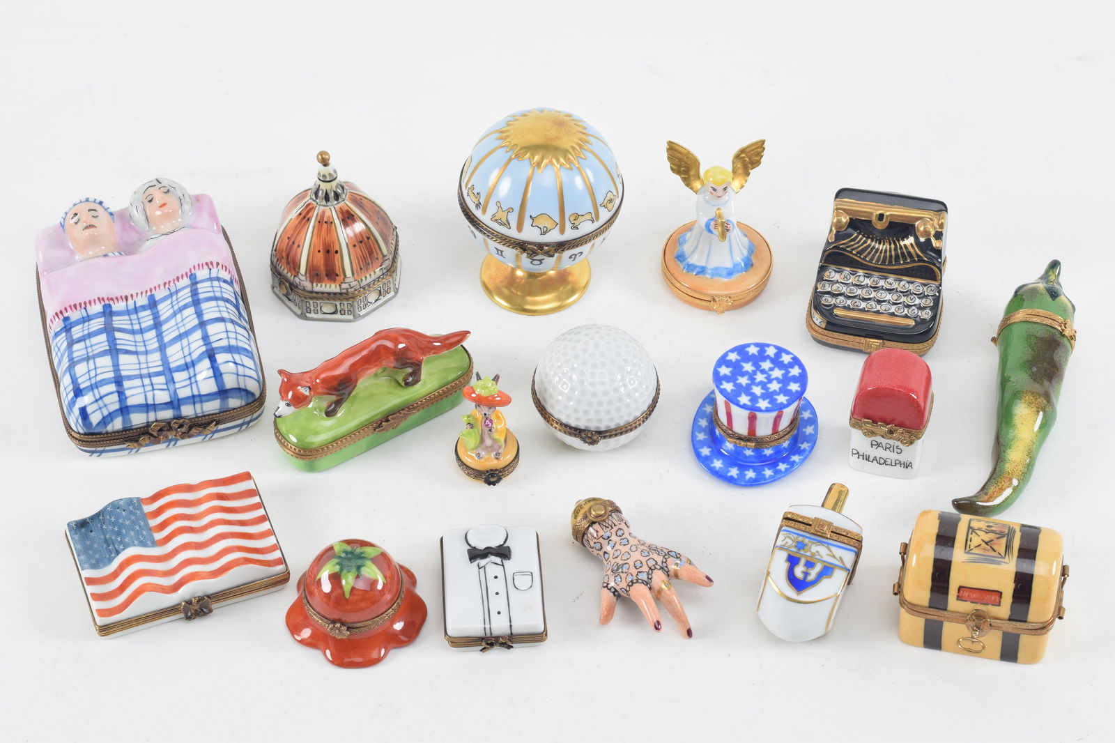 Collection of Limoges novelty boxes in a variety of forms, 20th Century.: Collection of Limoges novelty boxes in a variety of forms, 20th Century.