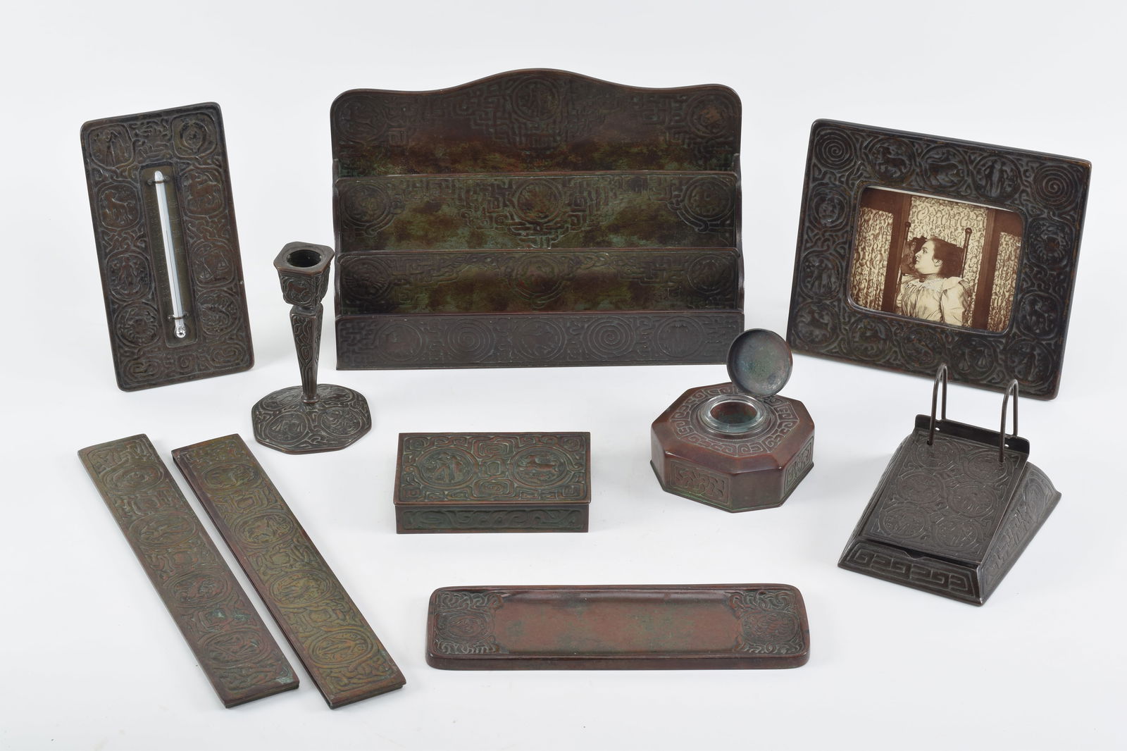 [9] Piece Tiffany Studios patinated bronze Zodiac pattern desk set. Each marked on base, Tiffany (1 of 14)