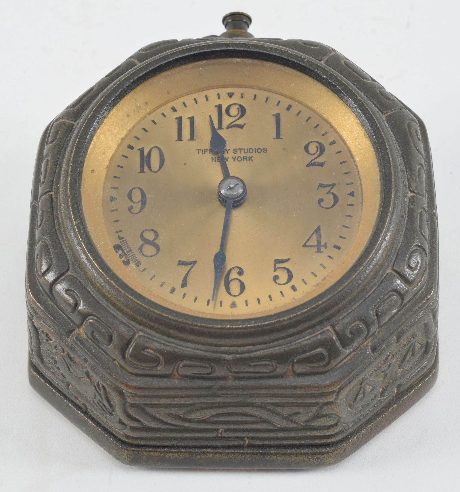 Tiffany Studios bronze desk clock, Zodiac pattern. Dore patination. Original key. Marked on base, (1 of 6)