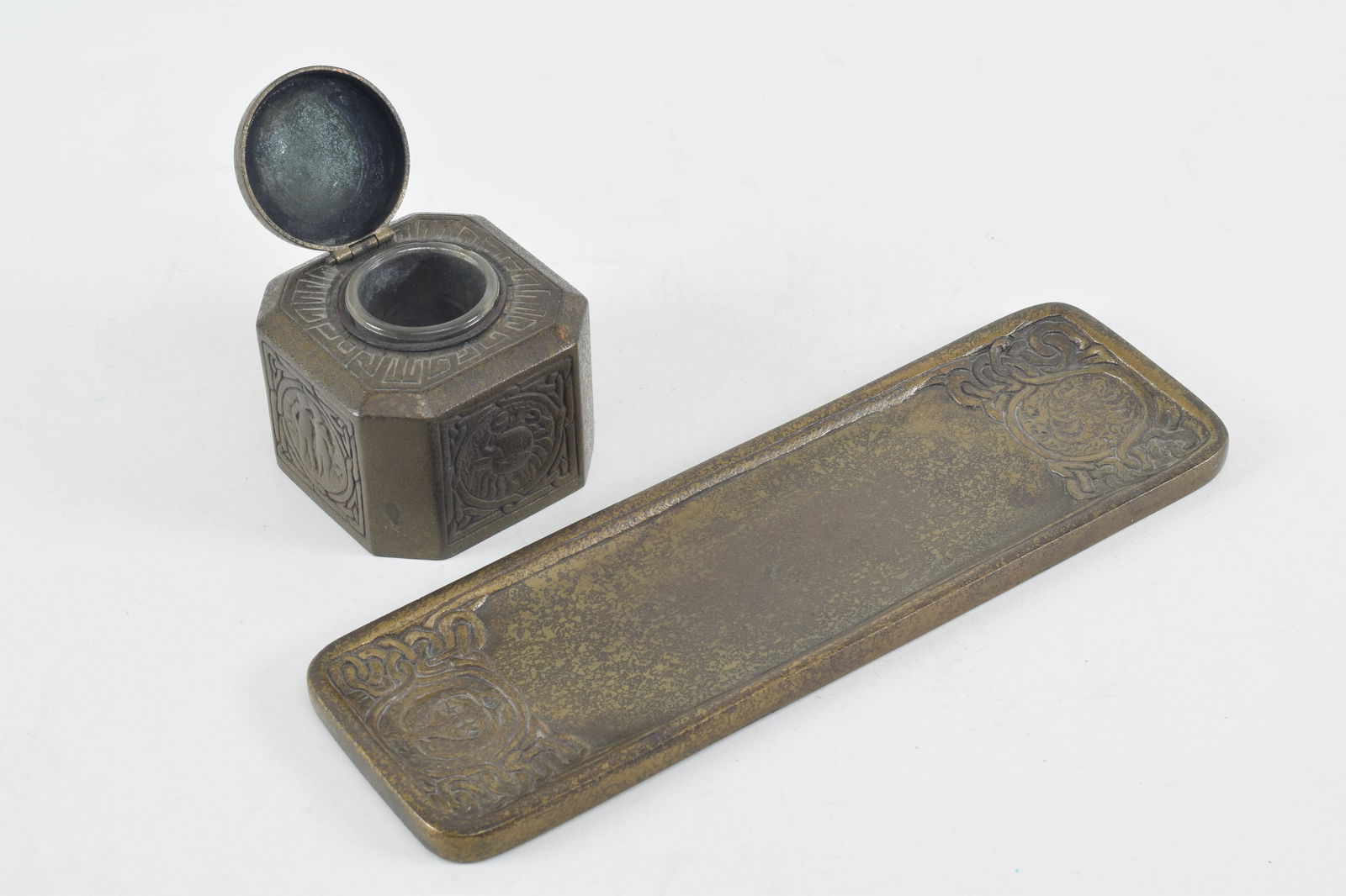 Two Tiffany Studios bronze desk items, an inkwell and pen tray, Zodiac pattern. Dore patination. (1 of 8)