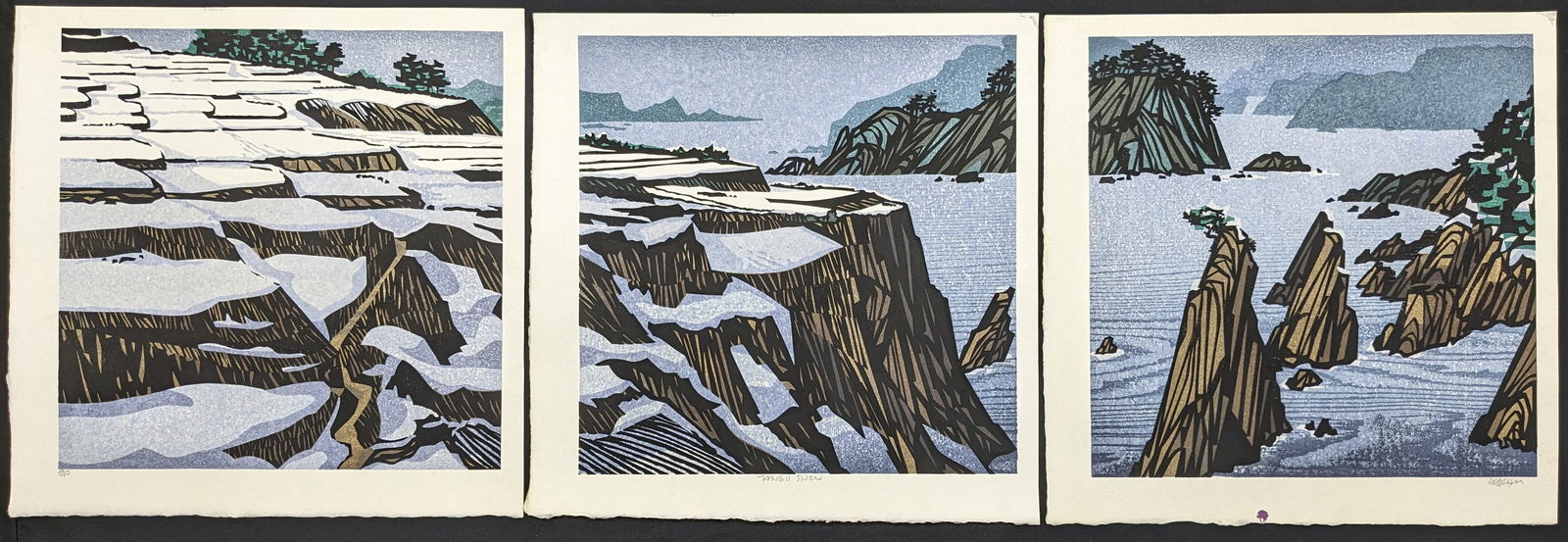 Clifton Karhu. "Tango Snow". Triptych woodblock prints depicting a snow covered rocky coastline. (1 of 7)