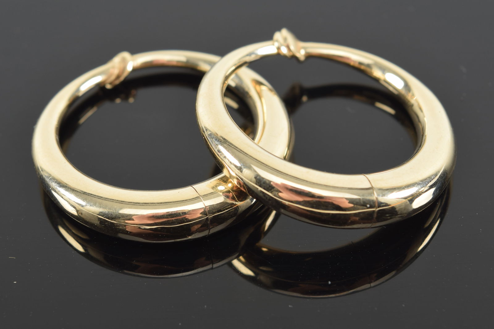 Tiffany 14K gold large hoop earrings. Marked. 1.1in diameter. 8.7 grams. (1 of 4)