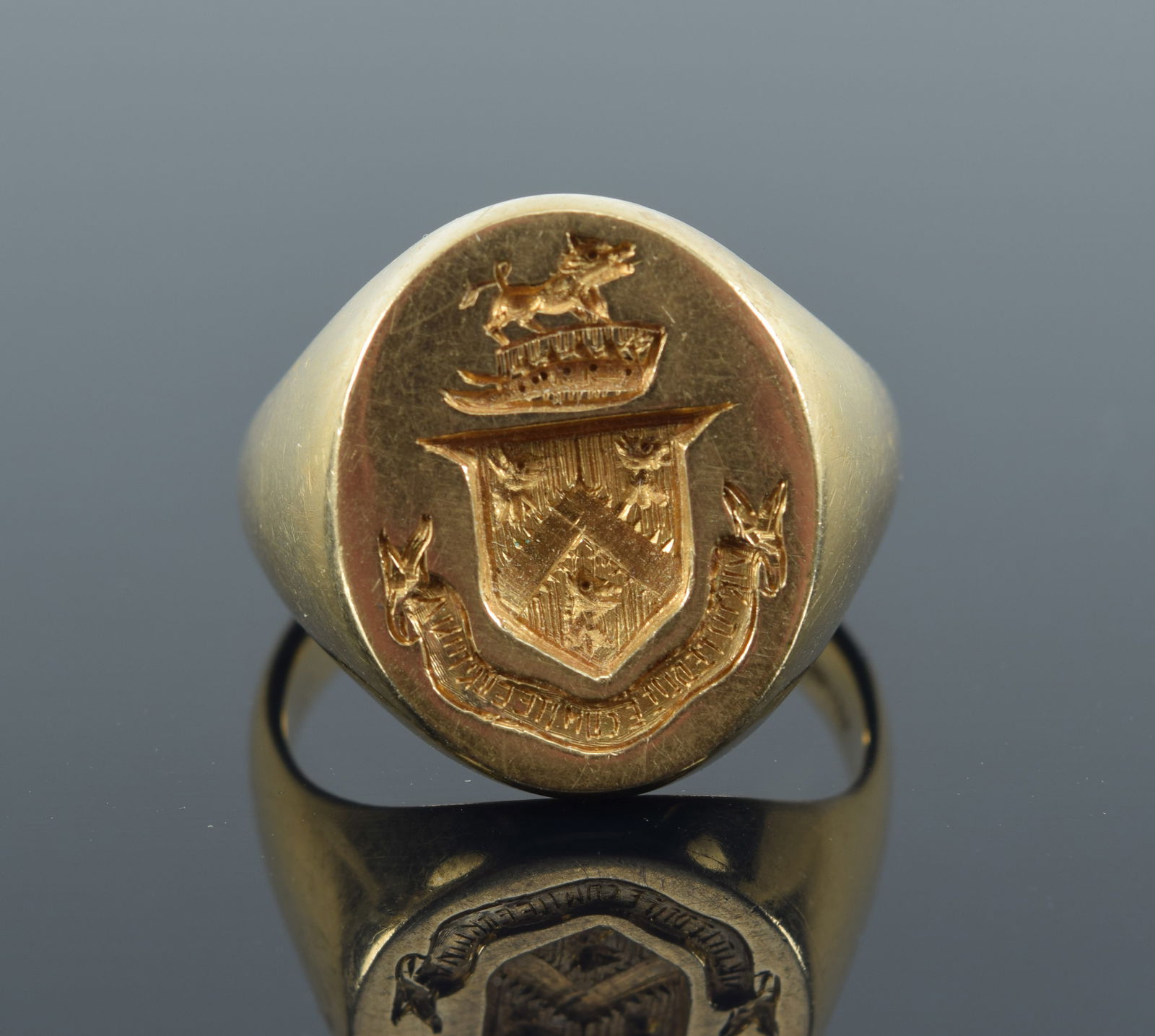 14K gold armorial signet ring. Crest with a boar above a crown and motto. Marked 14K. Etched (1 of 6)