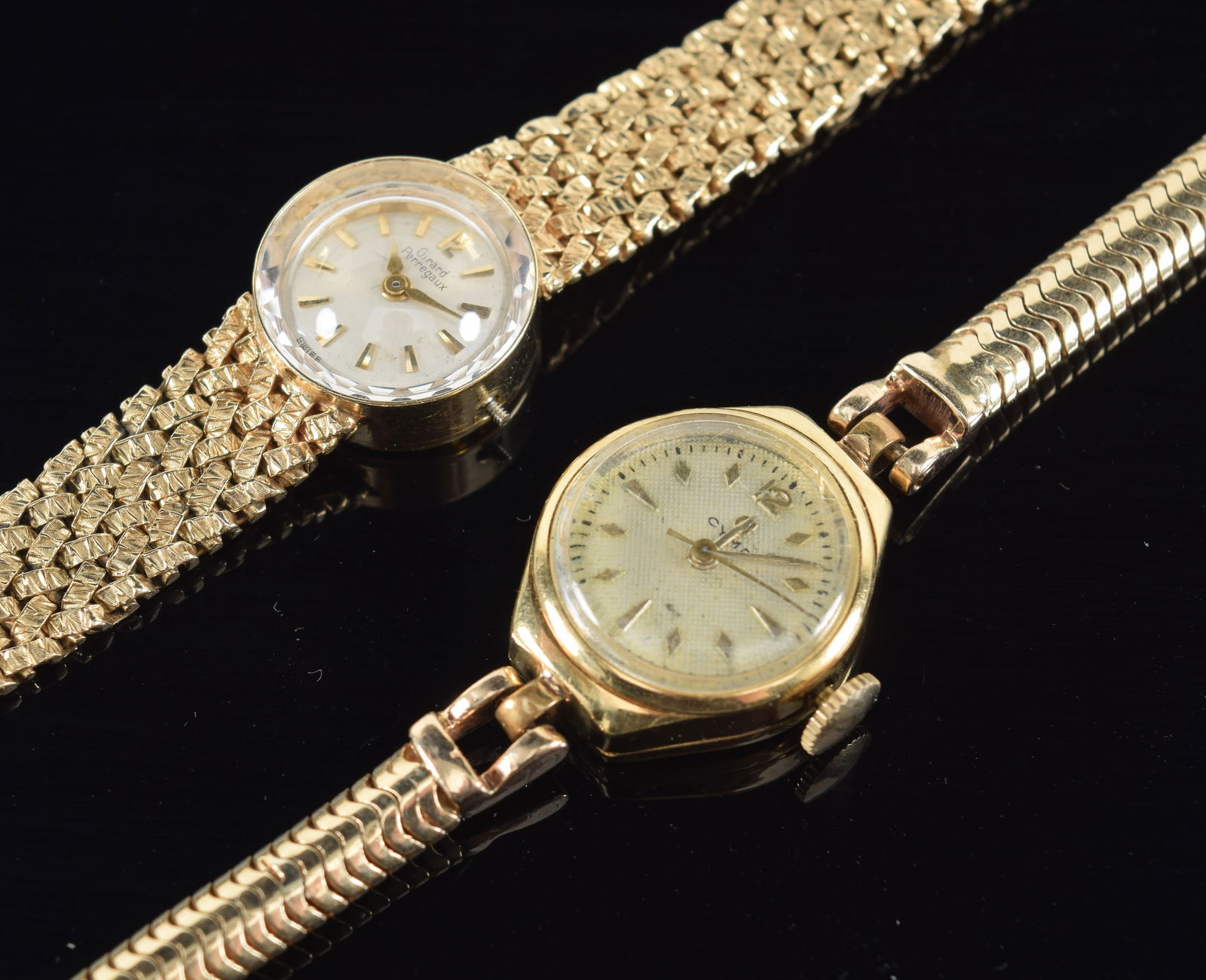 2 gold ladies wristwatches and bands. 1) 18K gold cyma watch. Marked inside case. Not working. Band (1 of 8)