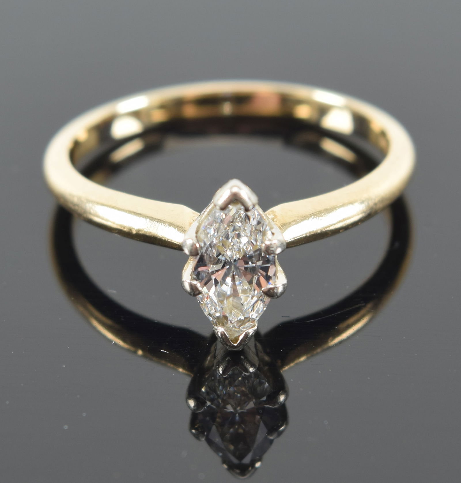 14K gold marquis diamond solitaire ring. Stone measures approx. 7mm x 4.2mm. Approx 0.5ct. (1 of 9)
