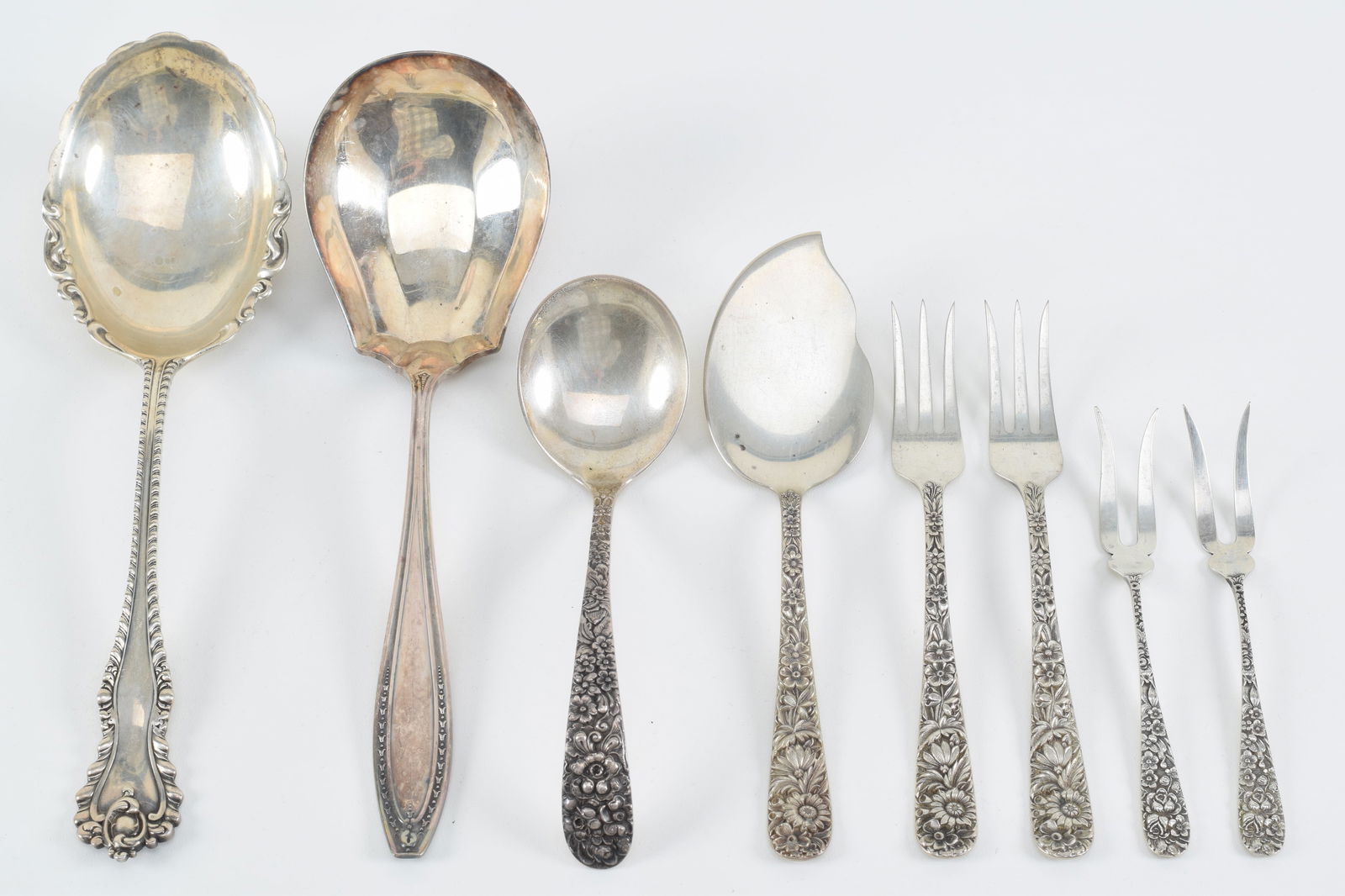 Assorted sterling silver serving pieces. To include: 1) 2 Stieff floral relief decorated pickle (1 of 5)