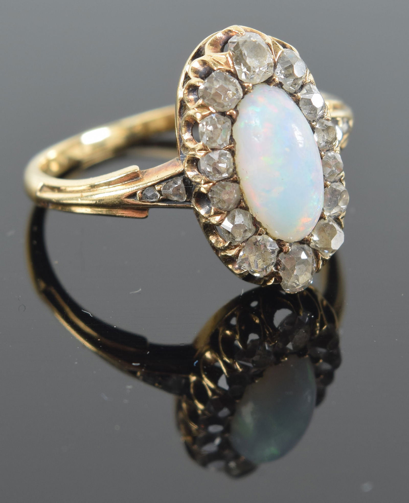 14K gold opal and diamond mounted ring. Unmarked. Tests as 14K or higher. 3.5 grams. Ring size 7. (1 of 6)