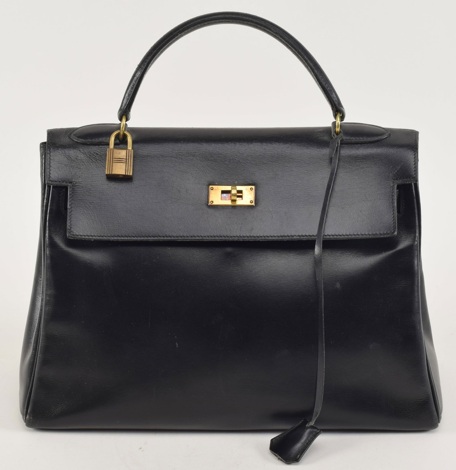 Vintage Hermes Kelly black leather handbag. Light wear consistent with use. 13in W x 9in H (without (1 of 9)