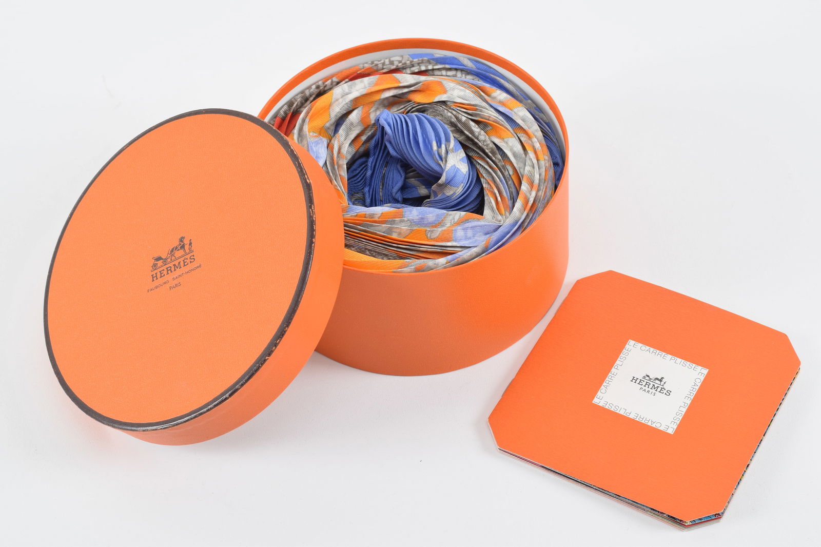 Hermes silk scarf new in original box. Includes booklet of various modes of wearing. Box: 5in wide. (1 of 6)