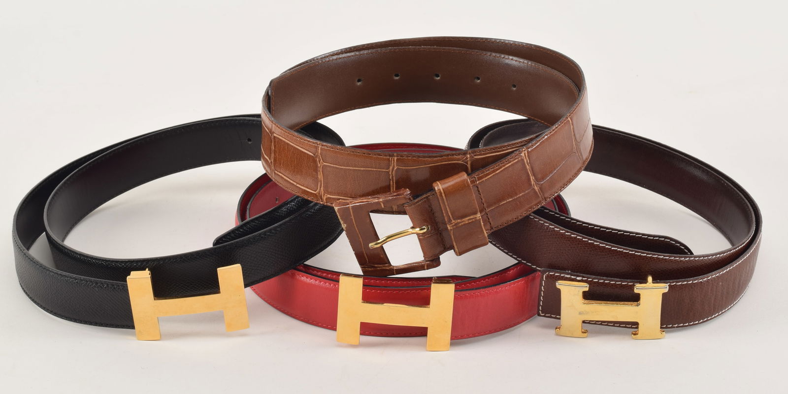 4 women's fashion leather belts. 3 by Lederer after Hermes style. 1 by Jaeger.: 4 women's fashion leather belts. 3 by Lederer after Hermes style. 1 by Jaeger.