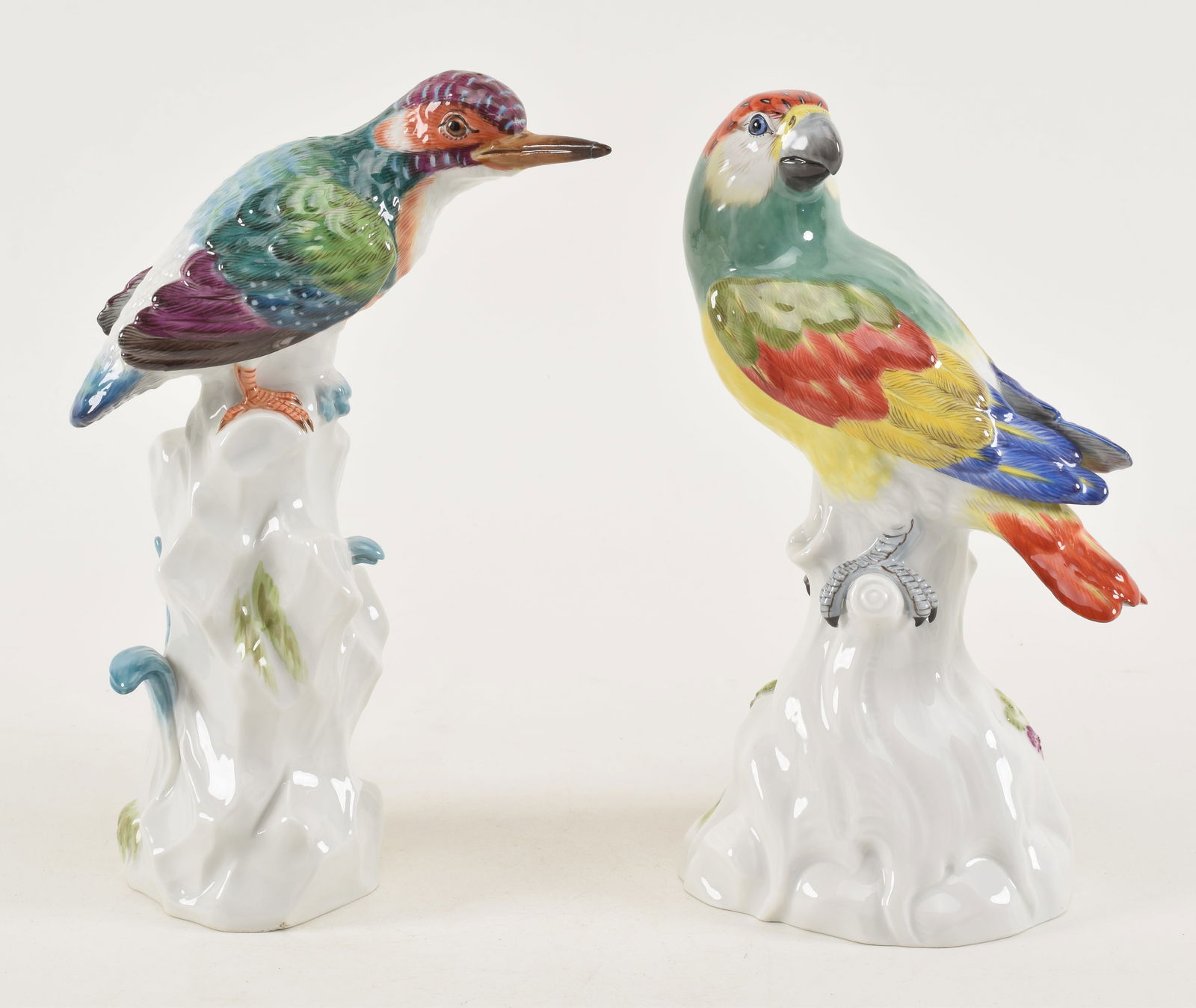 2 Meissen porcelain polychrome bid figures. Parrot and other tropical bird. Tip of beak repaired on (1 of 9)
