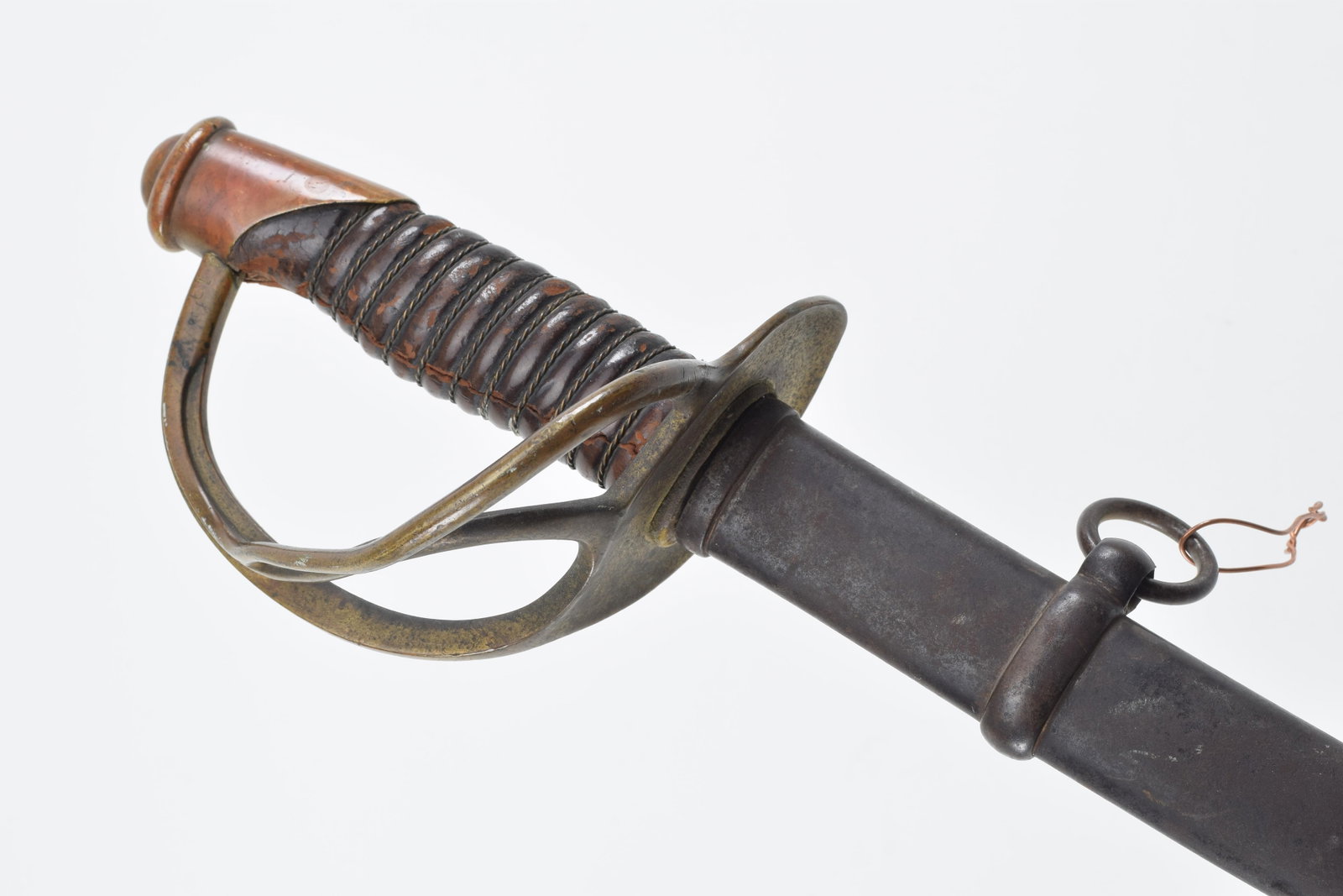Civil War cavalry sword. Mansfield & Lamb, Forestdale R.I. Stamped US, 1864, and JM 2 on reverse of: Civil War cavalry sword. Mansfield & Lamb, Forestdale R.I. Stamped US, 1864, and JM 2 on reverse of ricasso. Leather handle. Tip of blade broken off. Heavy damage to blade edge. 42.5in length.