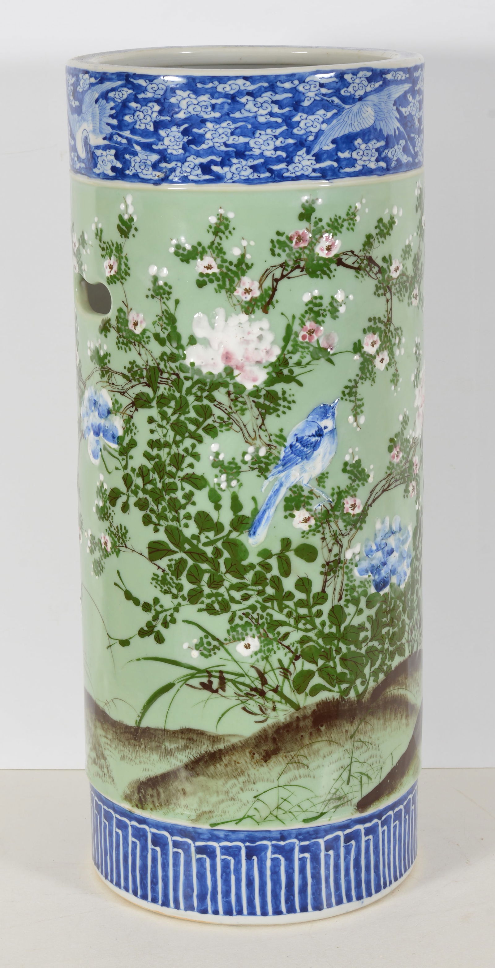 Porcelain umbrella stand. Japan. 19th century. Cylindrical form with pierced handles. Underglaze (1 of 5)