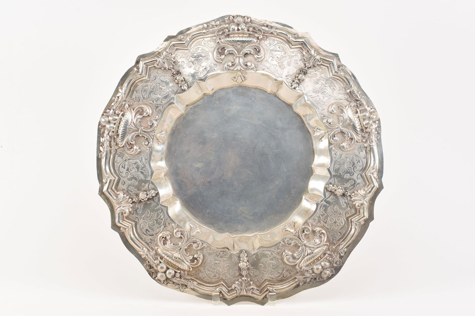 Large 19th century continental 800 silver ornately decorated charger. Shaped edge with embossed urn (1 of 10)