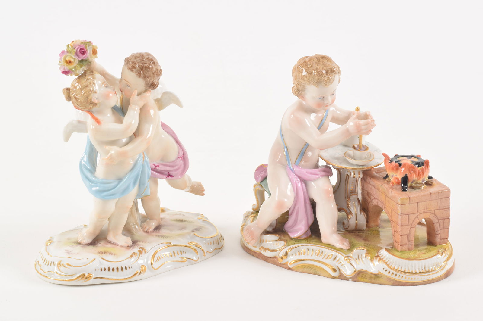 2 19th century Meissen porcelain figures. 1) Cherubs kissing under a floral wreath. Underglaze blue (1 of 7)