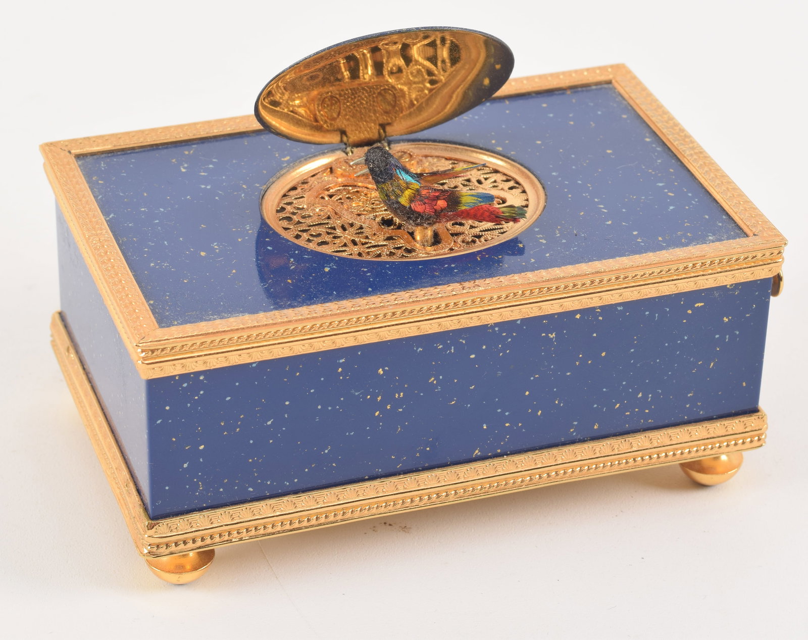 Reuge Swiss singing bird automaton box. Artist signed hand painted floral panel opens to reveal an (1 of 6)