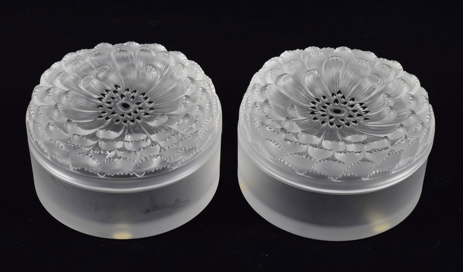 Pair of Lalique "Dhalia" frosted and decorated crystal covered boxes with floral lids. Marked (1 of 5)