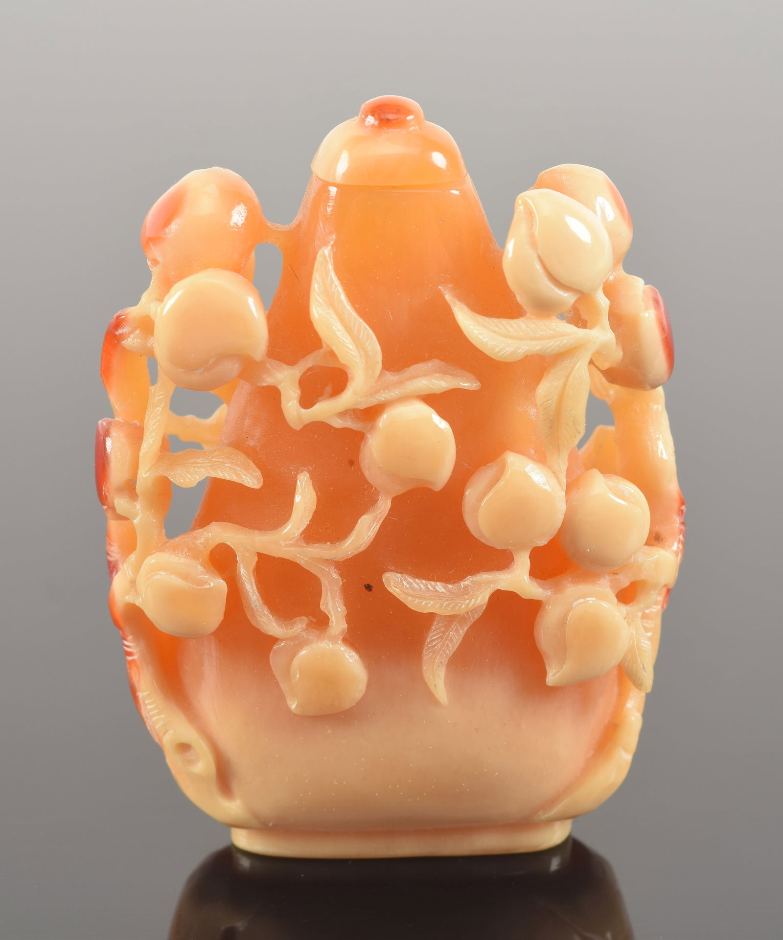 Hornbill snuff bottle. China. 19th century. Surface carved in high relief with a fruiting peach (1 of 5)