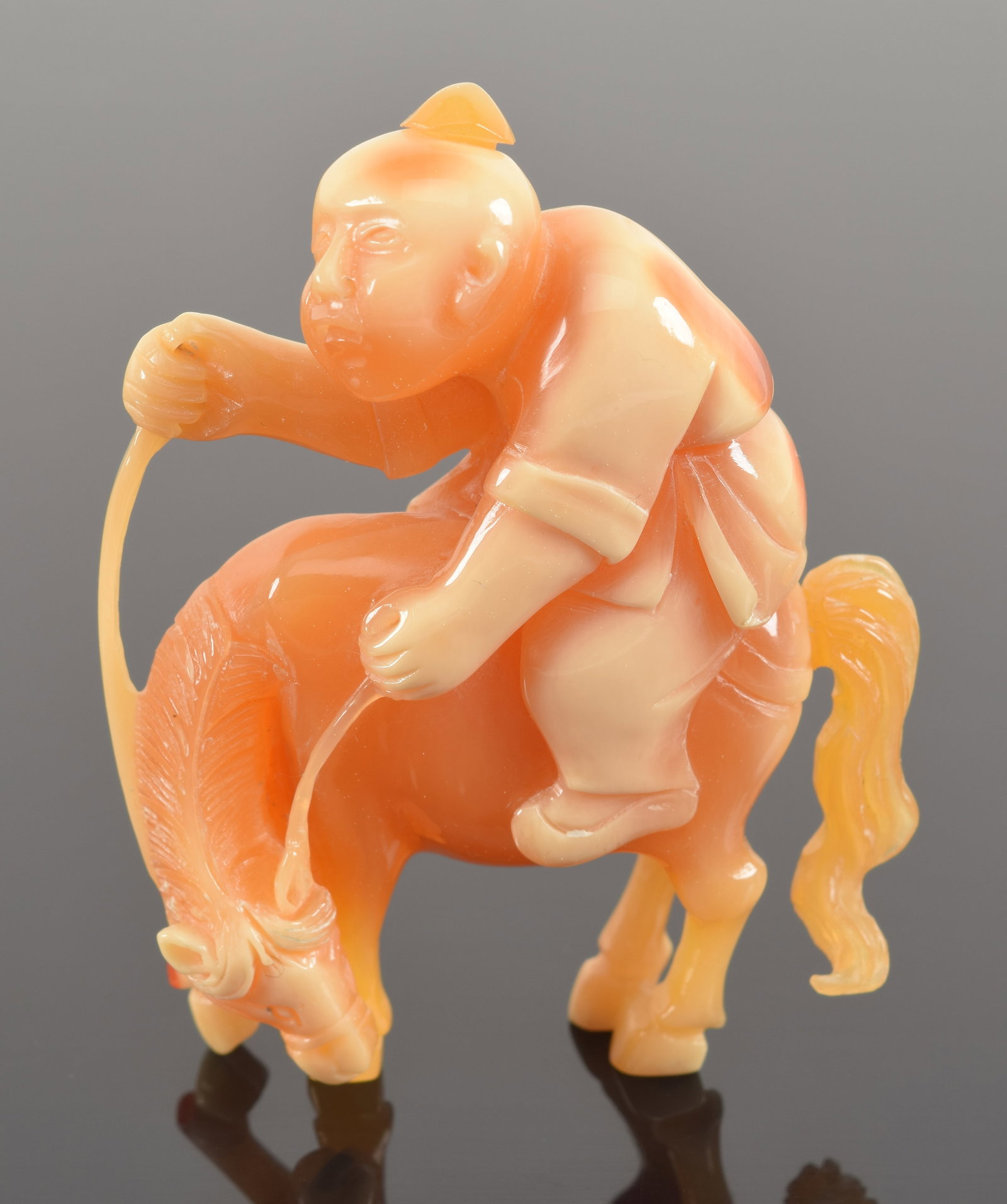 Hornbill carving. China. 19th century. Boy riding a horse. 2.5 x 2in. (1 of 4)