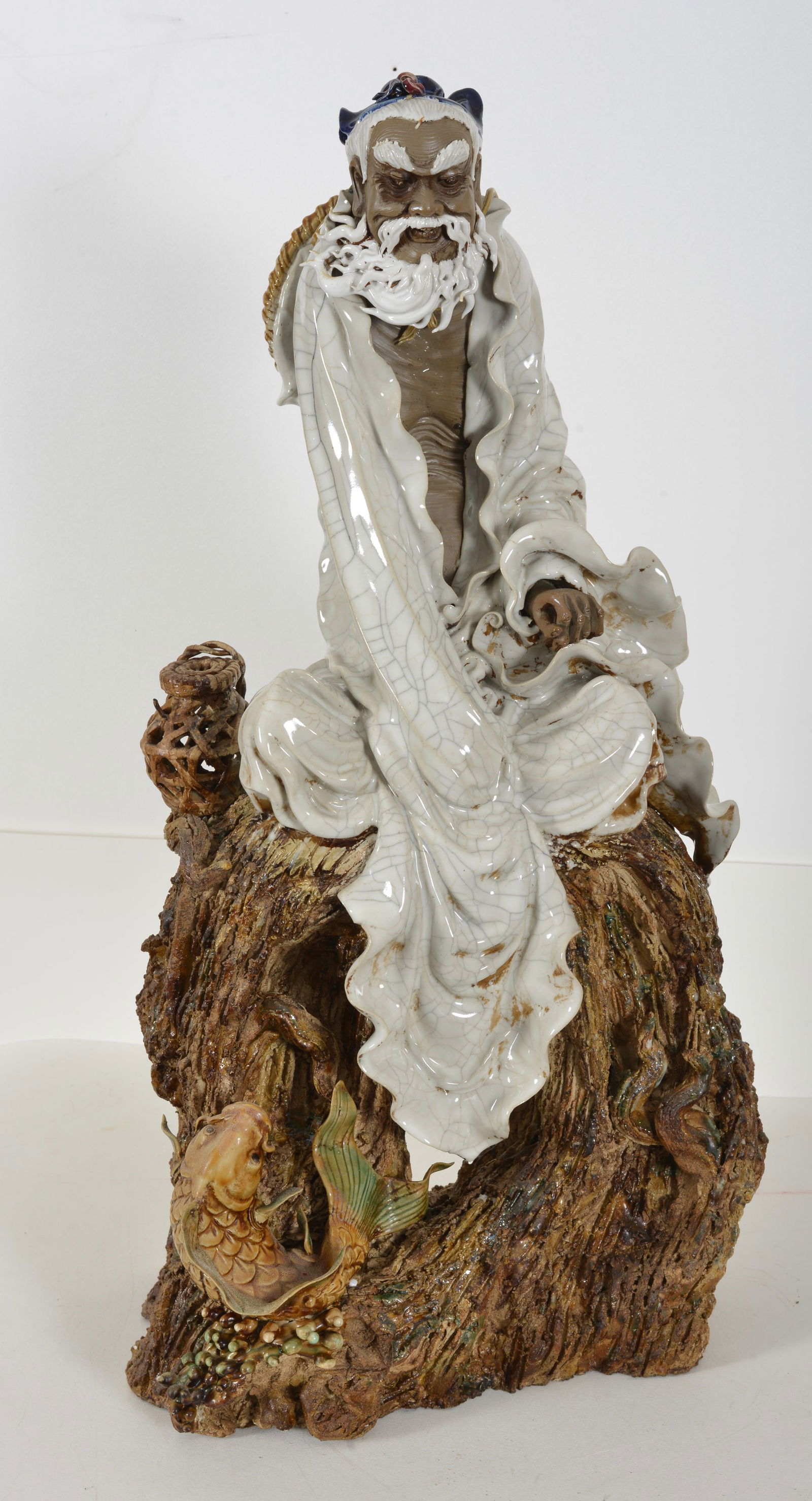 Large stoneware figure. Shih Wan ware. China. 20th century. figure of an immortal. 29in high. (1 of 8)