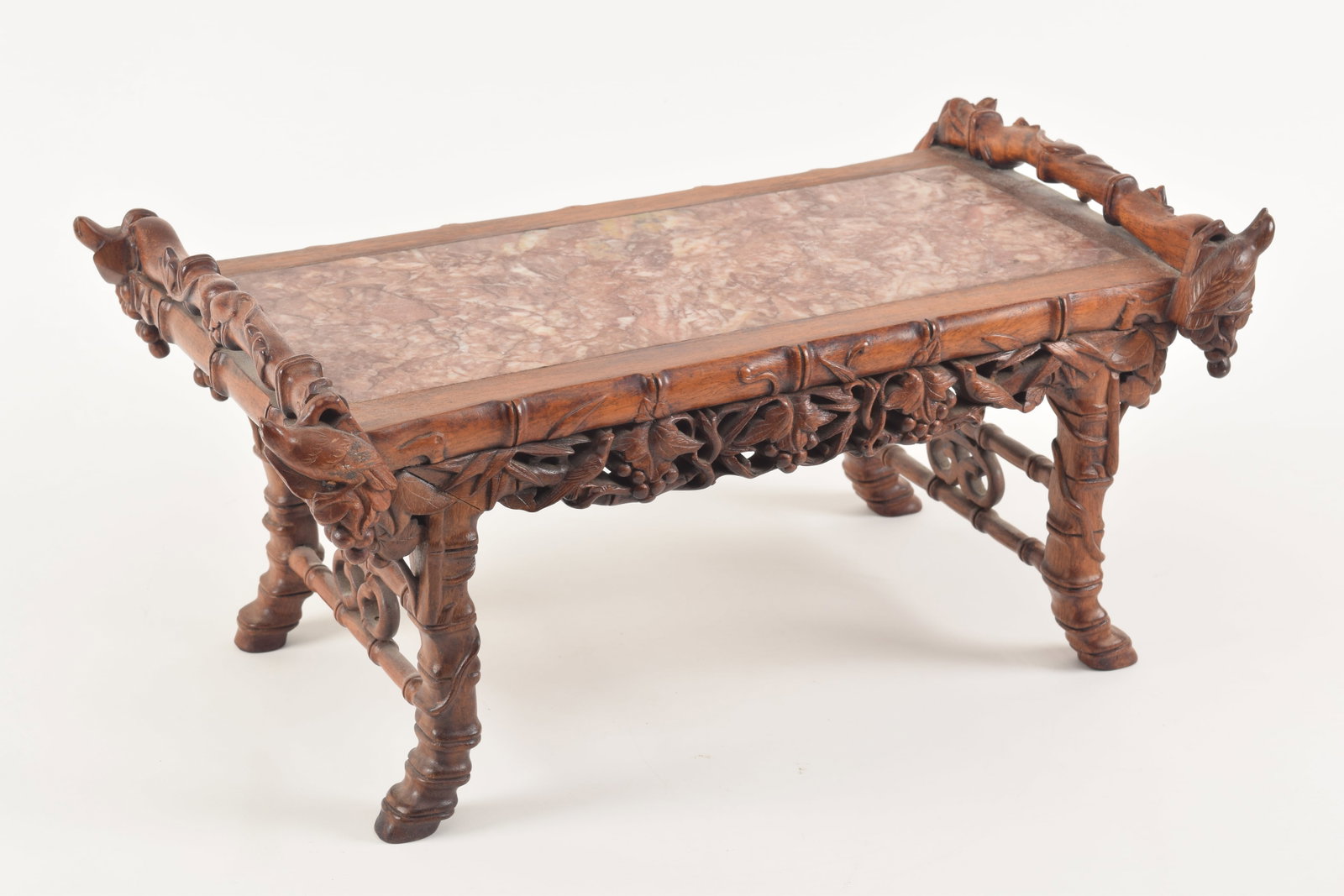 Tabletop carved wood stand with marble inset top. Carved bamboo decoration.: Tabletop carved wood stand with marble inset top. Carved bamboo decoration. Height 8in, Top 17.5 x 10 in.